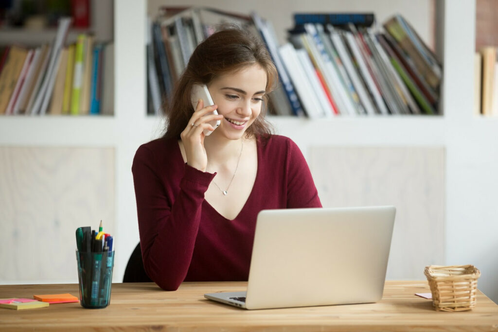 girl doing a phone screen interview for a software developer job